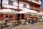 Preview: Schneider Gastro Marktschirm Jumbo 400cm Seilzug Stock 55mm wasserfest orange